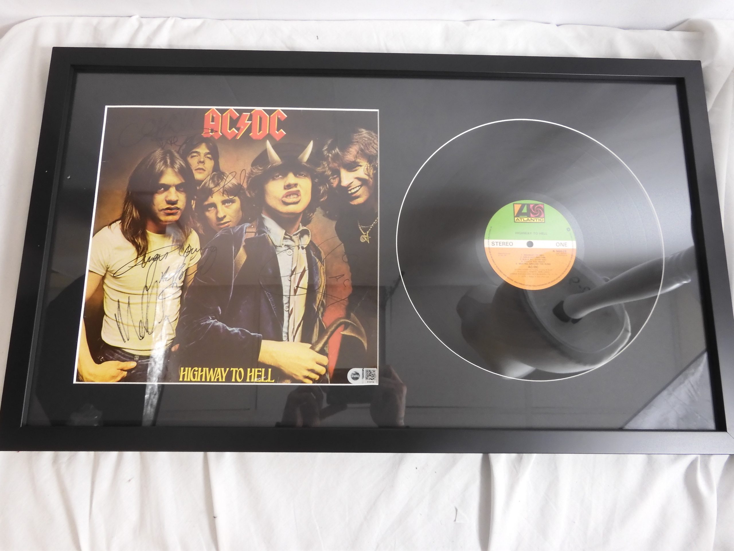 AC/DC Highway To Hell - K50628 1st Pressing - Signed by Bon Scott, Angus Young, Malcolm Young, Phil Rudd, Cliff Williams, with C.O.A.